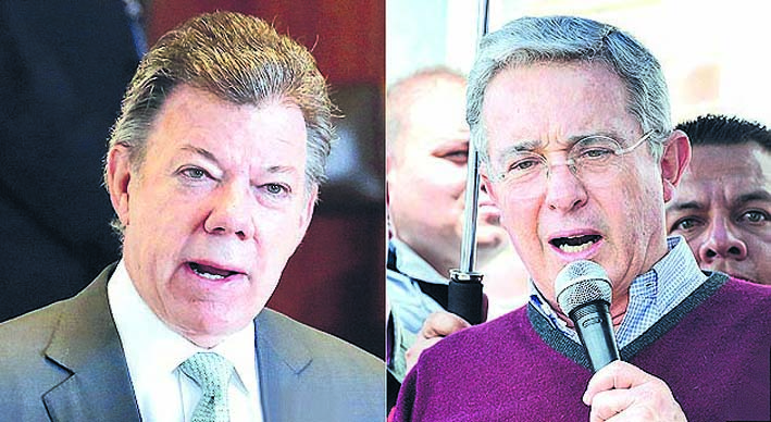 Juan Manuel Santos y  Álvaro Uribe.