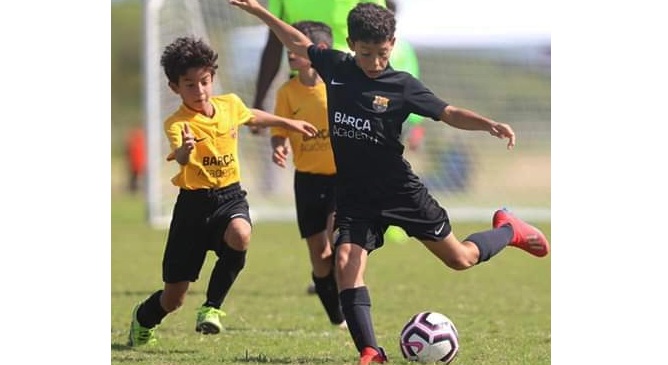 De izquierda el jugador riohachero, Enmanuel José Luis Suaza Gómez de 9 años de edad, es una sensación en el campeonato.